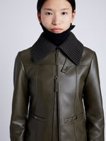 Proenza Schouler Detail image of model wearing Vaughn Jacket in Lightweight Leather in DARK FERN