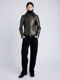 Proenza Schouler Front full length image of model wearing Vaughn Jacket in Lightweight Leather in DARK FERN fully zipped