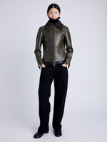 Proenza Schouler Front full length image of model wearing Vaughn Jacket in Lightweight Leather in DARK FERN fully zipped