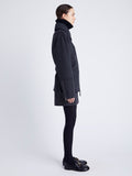 Proenza Schouler Side full length image of model wearing Poppy Jacket in Pinstripe Wool Cashmere in DARK GREY MELANGE