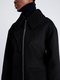 Proenza Schouler detail image of model wearing Poppy Jacket in Pinstripe Melton in black/navy