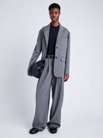 Proenza Schouler Front full length image of model wearing Lincoln Jacket in Melange Flannel in GREY MELANGE