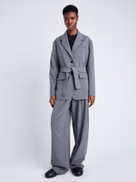 Proenza Schouler Front full length image of model wearing Lincoln Jacket in Melange Flannel in GREY MELANGE with belt tied