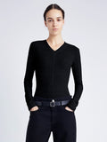 Proenza Schouler cropped front image of model wearing Delaney Bodysuit in Brushed Rib in black