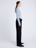 Proenza Schouler Side full length image of model wearing Delaney Bodysuit in Brushed Rib in ICE