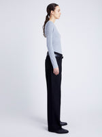 Proenza Schouler Side full length image of model wearing Delaney Bodysuit in Brushed Rib in ICE