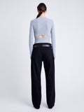 Proenza Schouler Back full length image of model wearing Delaney Bodysuit in Brushed Rib in ICE