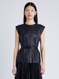 Proenza Schouler Front cropped image of model wearing Lyra Pleated Top in Lightweight Faux Leather in BLACK