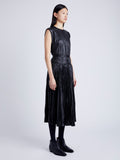 Proenza Schouler Side full length image of model wearing Lyra Pleated Top in Lightweight Faux Leather in BLACK