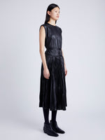 Proenza Schouler Side full length image of model wearing Lyra Pleated Top in Lightweight Faux Leather in BLACK