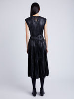 Proenza Schouler Back full length image of model wearing Lyra Pleated Top in Lightweight Faux Leather in BLACK