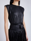 Proenza Schouler Detail image of model wearing Lyra Pleated Top in Lightweight Faux Leather in BLACK