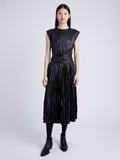 Proenza Schouler Front full length image of model wearing Lyra Pleated Top in Lightweight Faux Leather in BLACK