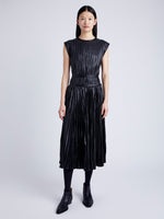 Proenza Schouler Front full length image of model wearing Lyra Pleated Top in Lightweight Faux Leather in BLACK