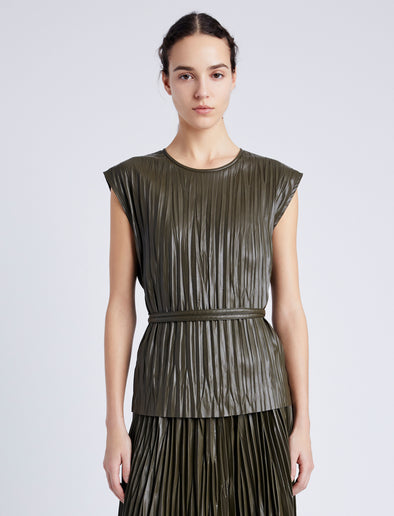 Proenza Schouler Front cropped image of model wearing Lyra Pleated Top in Lightweight Faux Leather in DARK FERN