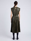 Proenza Schouler Back full length image of model wearing Lyra Pleated Top in Lightweight Faux Leather in DARK FERN