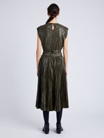 Proenza Schouler Back full length image of model wearing Lyra Pleated Top in Lightweight Faux Leather in DARK FERN