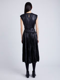 Proenza Schouler Back full length image of model wearing Rosalyn Pleated Skirt in Lightweight Faux Leather in BLACK