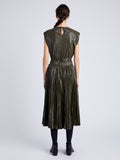 Proenza Schouler Back full length image of model wearing Rosalyn Pleated Skirt in Lightweight Faux Leather in DARK FERN