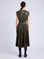 Proenza Schouler Back full length image of model wearing Rosalyn Pleated Skirt in Lightweight Faux Leather in DARK FERN