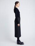 Proenza Schouler Side full length image of model wearing Kingsley Skirt in Soft Twill Coating in BLACK/GREY