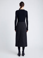 Proenza Schouler Back full length image of model wearing Kingsley Skirt in Soft Twill Coating in BLACK/GREY