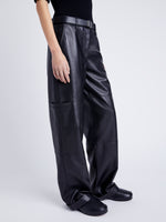 Proenza Schouler Side cropped image of model wearing Mason Pant in Lightweight Leather in BLACK