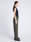 Proenza Schouler Side full length image of model wearing Mason Pant in Lightweight Leather in DARK FERN