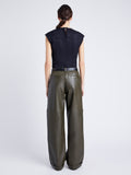 Proenza Schouler Back full length image of model wearing Mason Pant in Lightweight Leather in DARK FERN