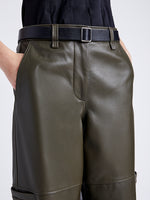 Proenza Schouler Detail image of model wearing Mason Pant in Lightweight Leather in DARK FERN