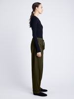 Proenza Schouler Side full length image of model wearing Preston Drawstring Pant in Tech Cotton in DARK FERN