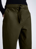 Proenza Schouler Detail image of model wearing Preston Drawstring Pant in Tech Cotton in DARK FERN