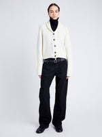 Proenza Schouler Front full length image of model wearing Lou Knit Cardigan in Wool Blend in OFF WHITE