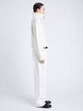 Proenza Schouler Side full length image of model wearing Sienna Knit Sweater in Wool Blend in OFF WHITE