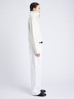 Proenza Schouler Side full length image of model wearing Sienna Knit Sweater in Wool Blend in OFF WHITE