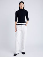 Proenza Schouler Front full length image of model wearing Daxton Sweater in Viscose Rib in BLACK