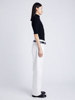 Proenza Schouler Side full length image of model wearing Daxton Sweater in Viscose Rib in BLACK