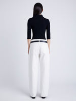 Proenza Schouler Back full length image of model wearing Daxton Sweater in Viscose Rib in BLACK