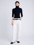 Proenza Schouler Front full length image of model wearing Daxton Sweater in Viscose Rib in BLACK in high neck