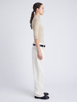 Proenza Schouler Side full length image of model wearing Daxton Sweater in Viscose Rib in KHAKI