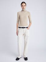 Proenza Schouler Front full length image of model wearing Daxton Sweater in Viscose Rib in KHAKI in high neck