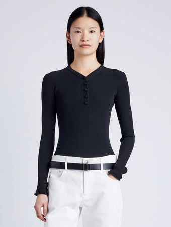 Proenza Schouler cropped front image of model wearing Isla Knit Henley in Ribbed Knits in black