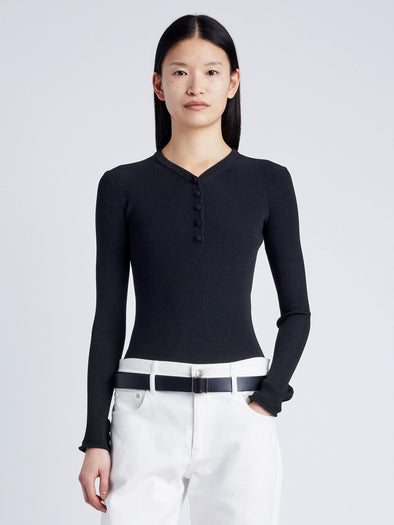 Proenza Schouler cropped front image of model wearing Isla Knit Henley in Ribbed Knits in black