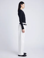 Proenza Schouler side image of model wearing Isla Knit Henley in Ribbed Knits in black