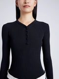 Proenza Schouler detail image of model wearing Isla Knit Henley in Ribbed Knits in black