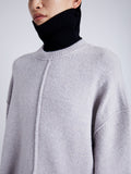 Proenza Schouler Detail image of model wearing Kellen Sweater in Wool in LIGHT GREY