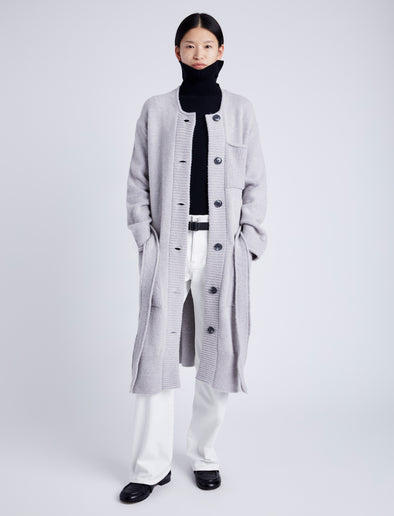 Proenza Schouler Front full length image of model wearing Lenora Knit Cardigan in Wool Blend in LIGHT GREY