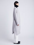 Proenza Schouler Side full length image of model wearing Lenora Knit Cardigan in Wool Blend in LIGHT GREY