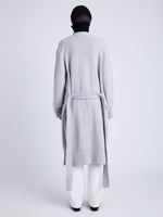 Proenza Schouler Back full length image of model wearing Lenora Knit Cardigan in Wool Blend in LIGHT GREY