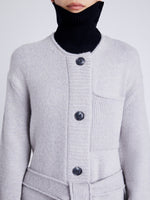 Proenza Schouler Detail image of model wearing Lenora Knit Cardigan in Wool Blend in LIGHT GREY